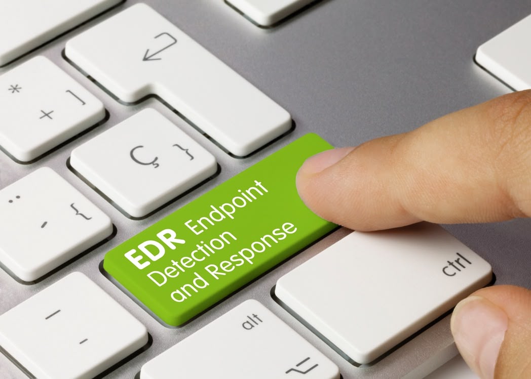EDR an image of a keyboard with an EDR Endpoint Detection and Response printed into it