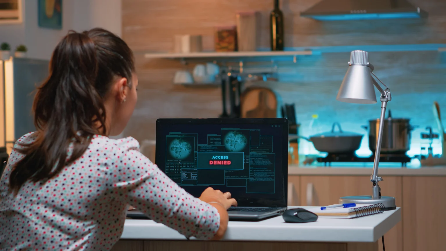 cyberattack a woman checking on her pc during a cyberattack